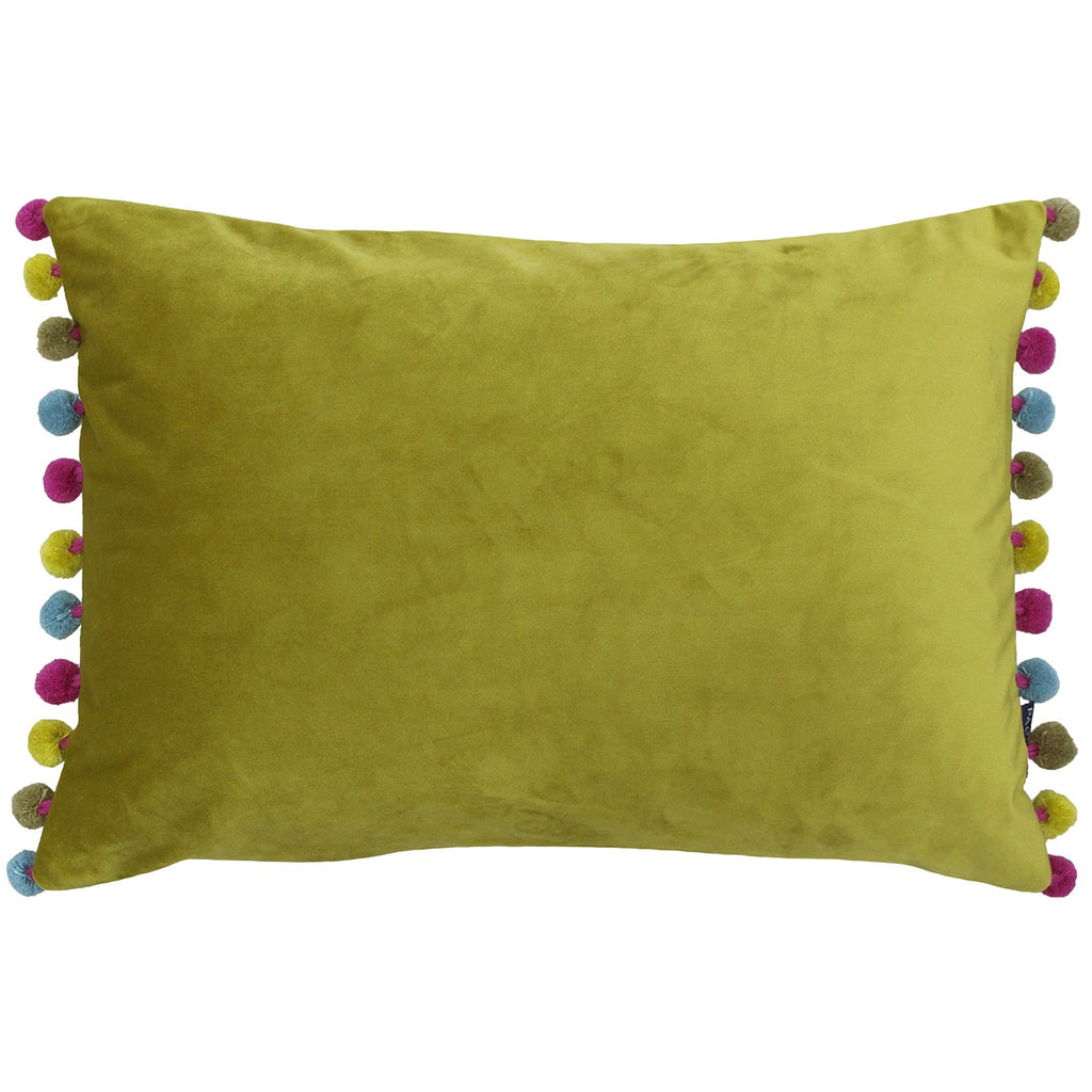 A rectangular cushion with a yellow-green velvet cover that is edged along 2 sides with multicoloured pompoms.