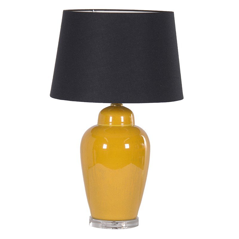 A ceramic mustard lamp with perspex base, finished with a black linen shade. 