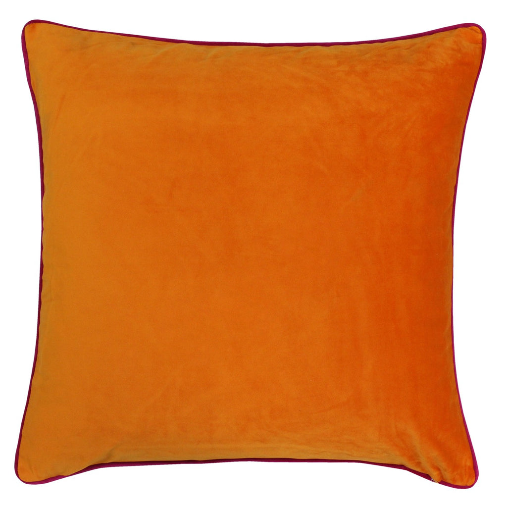 A large square cushion with a bright orange and hot pink velvet cover. 