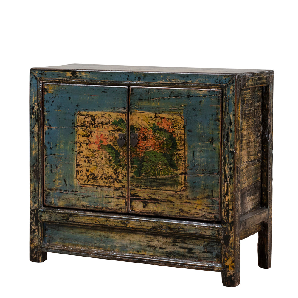 Vintage wooden cabinet with distressed lacquer on a white background