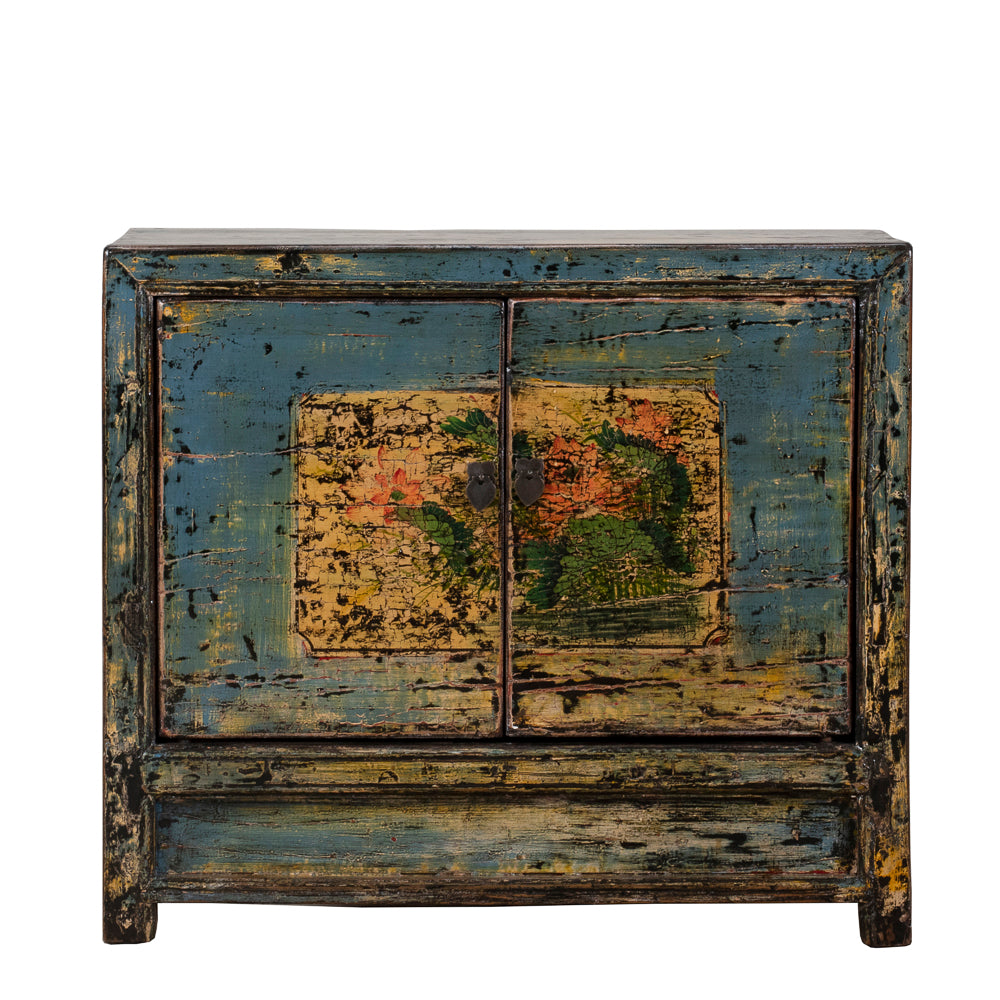 Vintage wooden cabinet with distressed lacquer on a white background
