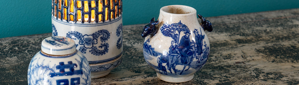 orchid furniture blue and white traditional. photo is depicting tea light holder, small ginger jar and vaseceramics 