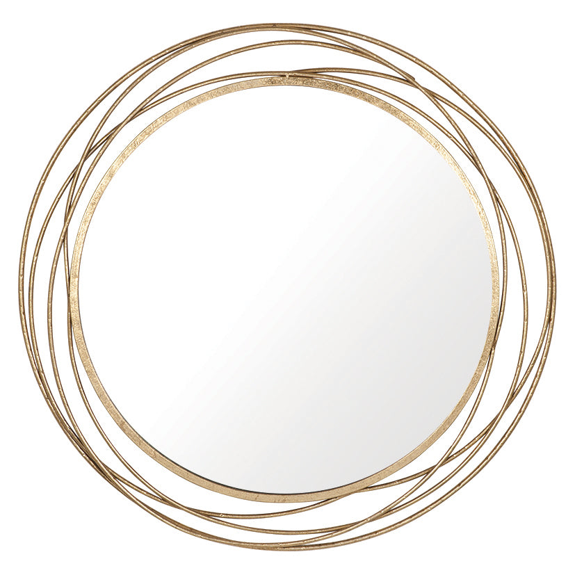 A round mirror with gold strands encircling it.