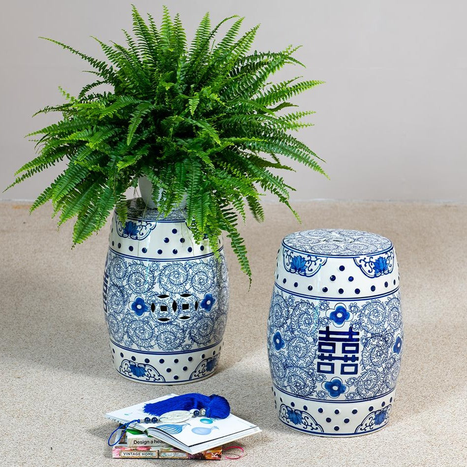 Chinese blue and white ceramic barrel stools hand-painted with symbols of happiness and prosperity, presented in the Stockbridge interior store. 