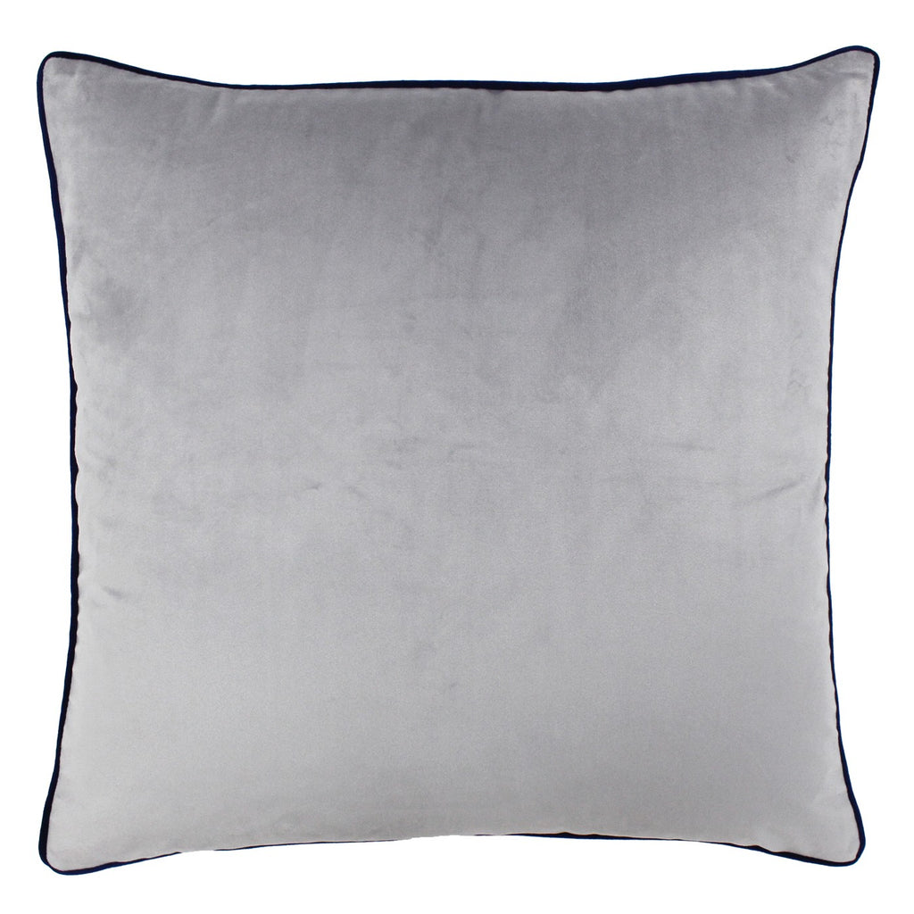 A large square cushion with a grey velvet cover and dark blue piping. 